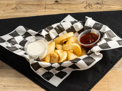 Sidewinder potato wedges with dipping sauces at Durkin&rsquo;s Pizza